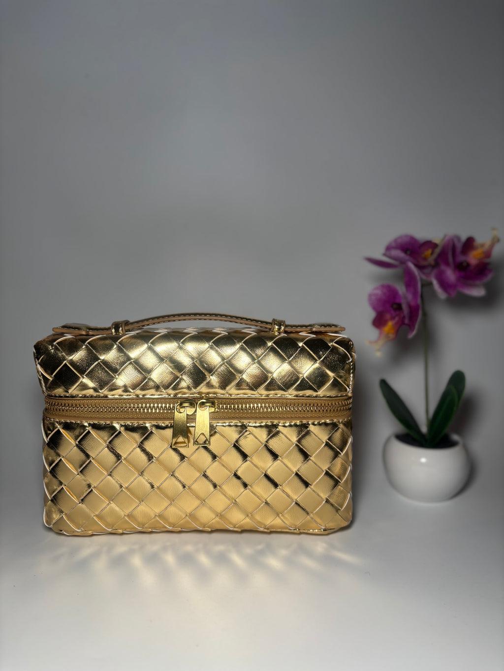 Sac doré tressé à bandoulière