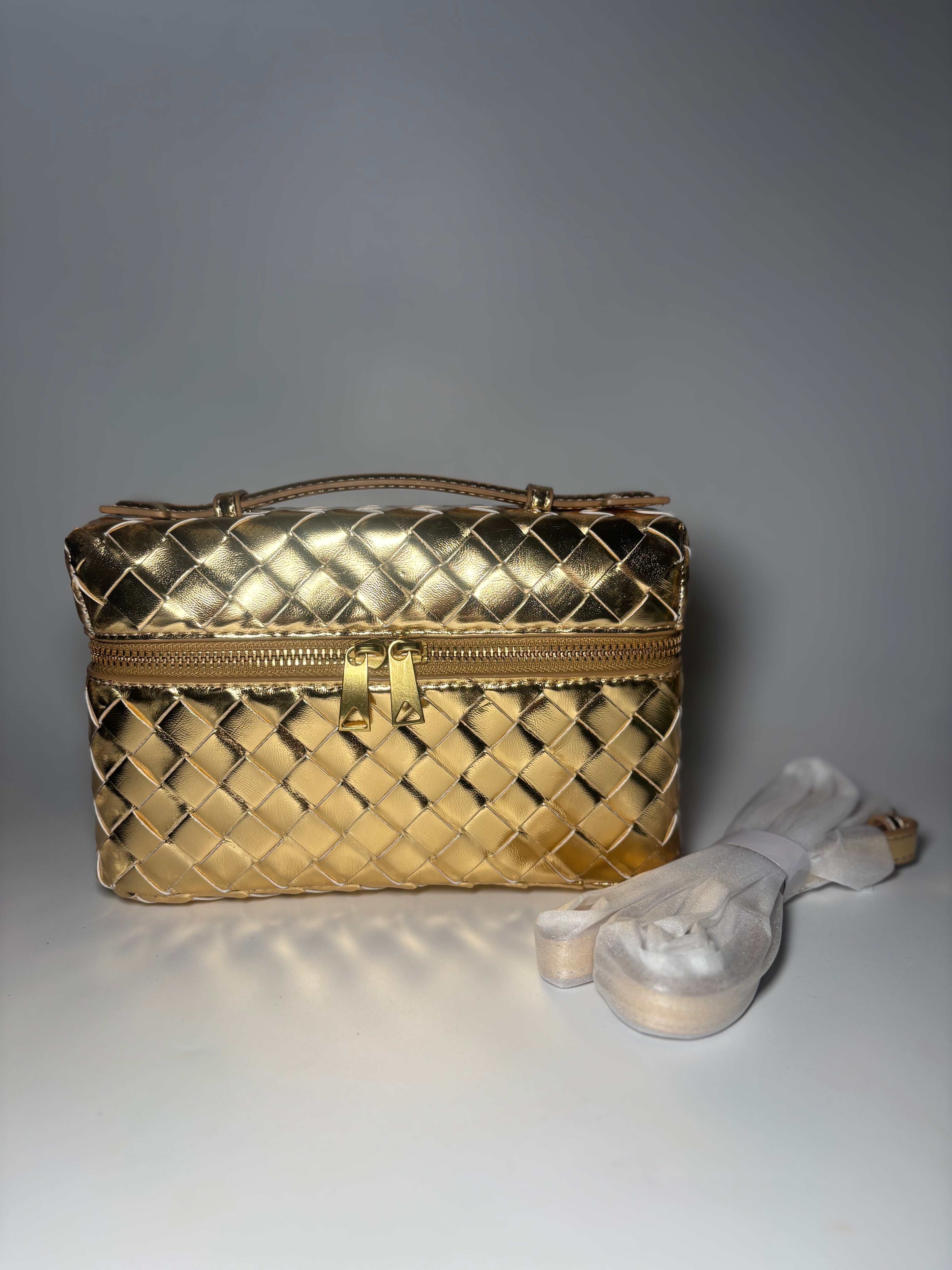 Sac doré tressé à bandoulière